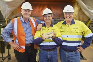 (from left) Peter Bradford, CEO of IGO, Duncan Gibbs, GM Tropicana, and Michael Erickson, SVP Australia. They are holding the 1 Moz gold bar.