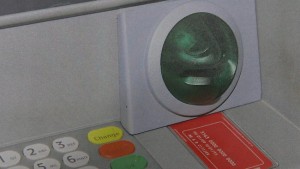 Card skimmer on ATM machine