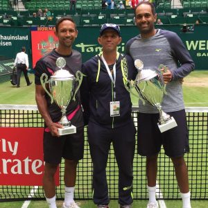 From left; South African Raven Klaasen, touring coach Jeff Coetzee (also from South Africa) and American player Rajeev Ram after winning the doubles title of the ATP Gerry Weber Open on Sunday.
