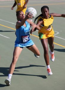 Roche de Reuck of Western Cape (Left) and Lentsa Motau of Mpumalanga in action during day 4 of the 2016 Spar National Netball Championships at Hoy Park Sports Complex on August 11, 2016 in Durban, South Africa.
