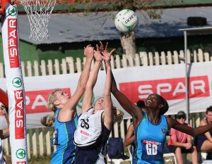 Vanes-Mari du Toit (left) and Phumza Maweni of the Western Cape competing with Rieze Straeuli of the Free State for position Wednesday at the Hoy Park Sports Complex in Durban during the SPAR National Netball Championships 2016.