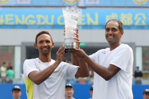 (Left) Raven Klaasen of South Africa with his doubles partner, (Right) American Rajeev Ram after winning the Chengdu Open Doubles title on Sunday played at Chengdu, China.